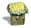 Sweden Wedding Sweden,:Yellow roses group arrangement in glass pot